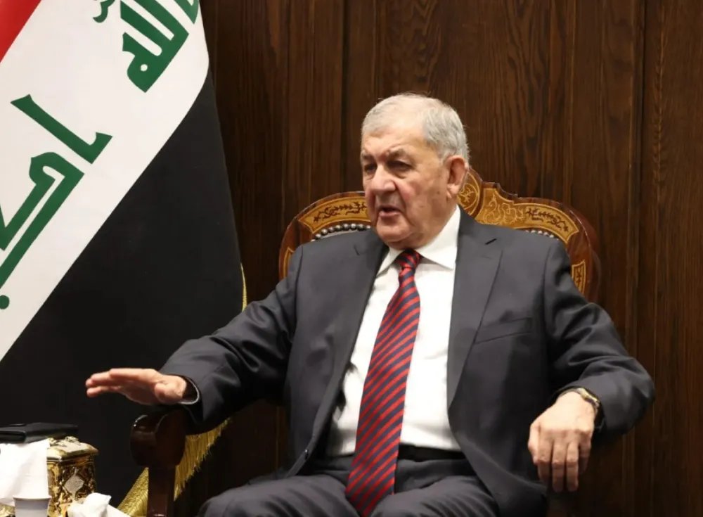 الرئيس العراقي يثني على قرار رفع العقوبات الأمريكية عن سوريا ويدعو الأسد للقمة العربية