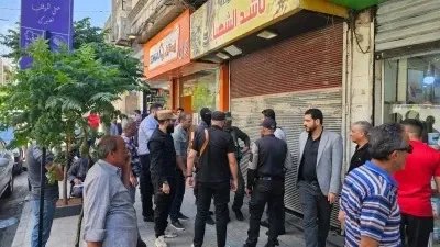 حملة في حلب: إغلاق محال تجارية بسبب صور وشعارات النظام السابق