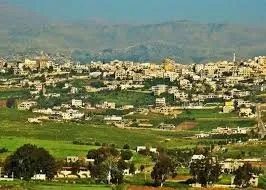 نزوح عشرات اللاجئين السوريين من الوزاني إثر منشورات إسرائيلية تهدد بالقصف