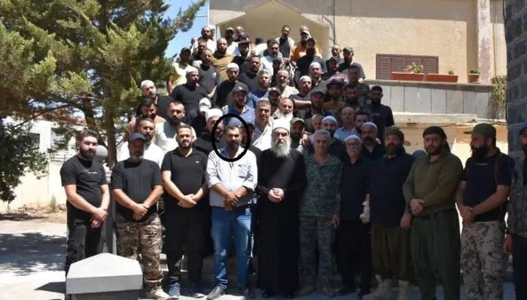 تفاصيل مثيرة: مطلوب للإنتربول بتهم تهريب سلاح ومخدرات يتبوأ منصباً قيادياً في "الحرس الوطني" بالسويداء
