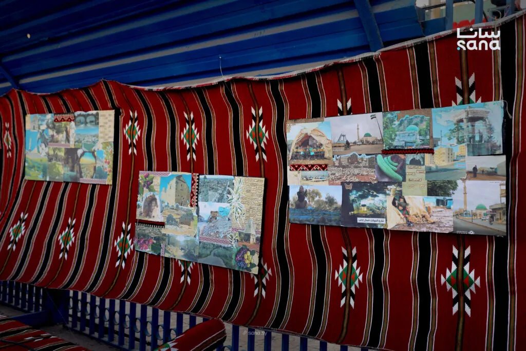 معرض "سردية إدلبية" يجسد معاناة المهجرين ويطلق بارقة أمل للعودة